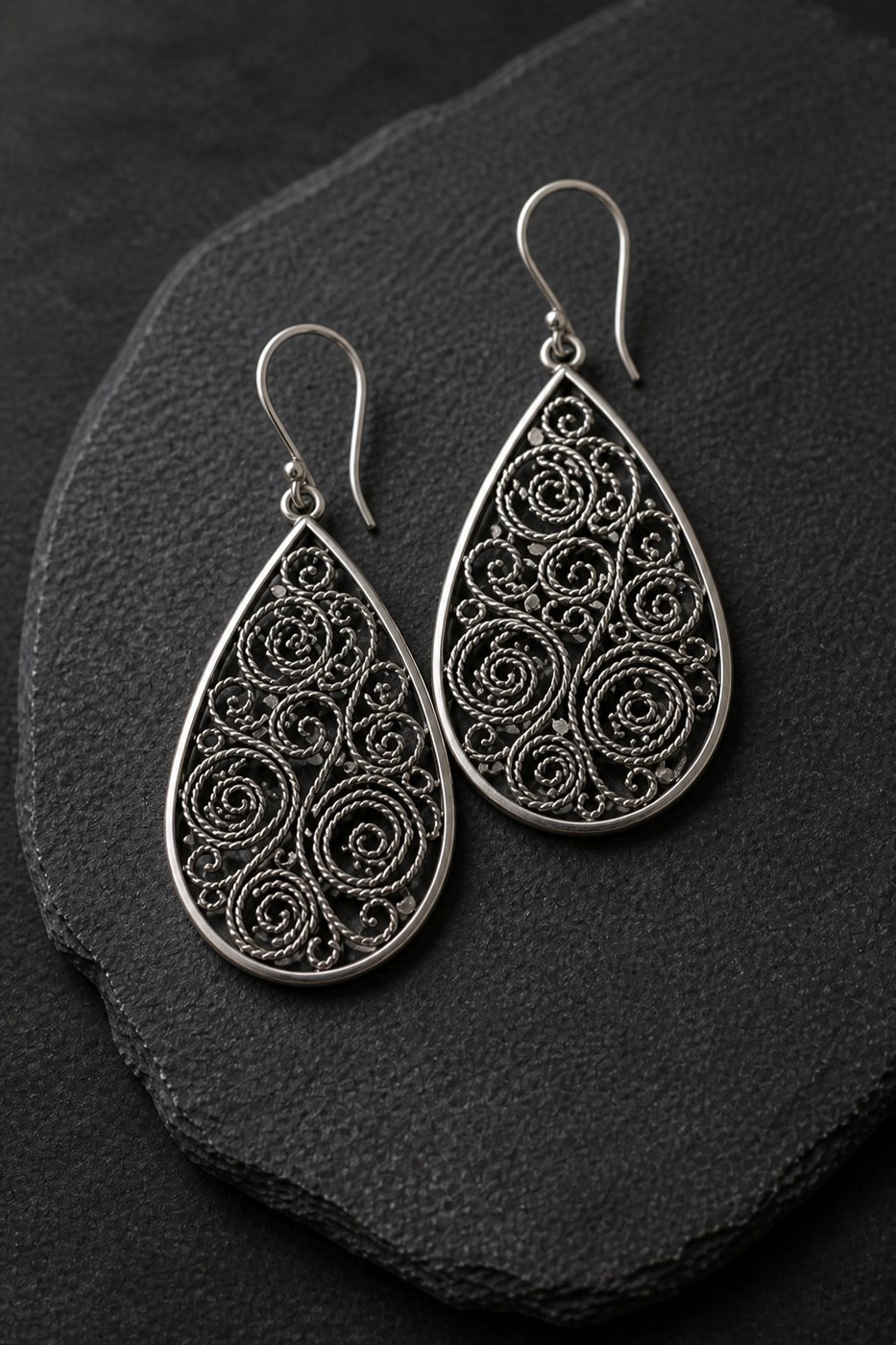 Aretes Pacha en plata 950, fotografía de estudio