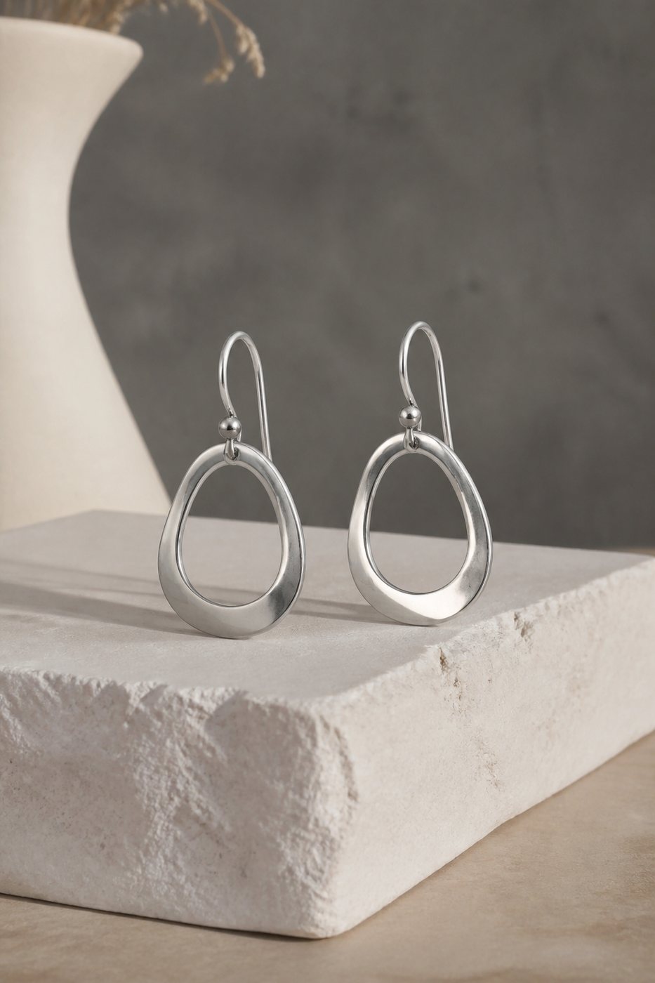 Aretes Wayra en plata 950, fotografía de estudio